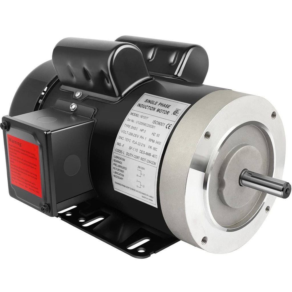 Close-up view of a single-phase induction motor with detailed specifications on its label, including voltage and RPM information.